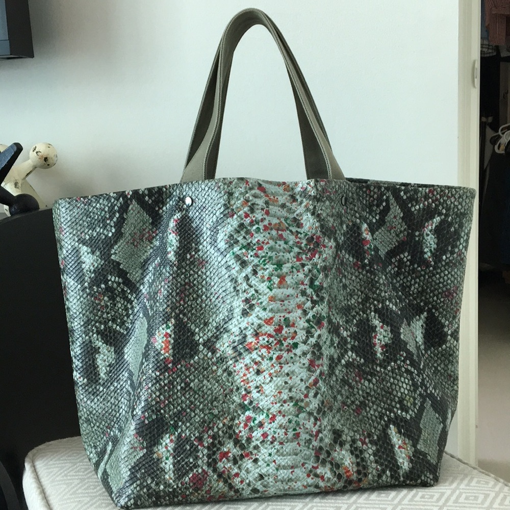 Faux python green handbag